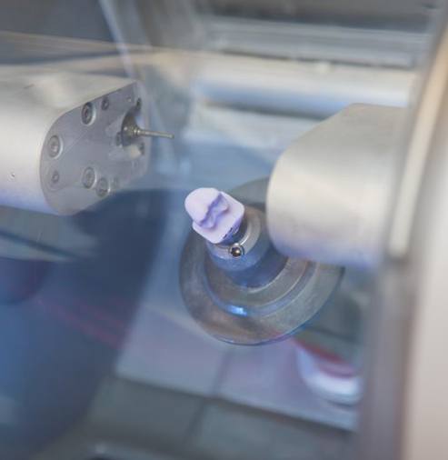 a ceramic dental crown in a CEREC milling machine
